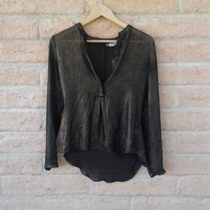 Jennifer Lopez black gold sheer blouse